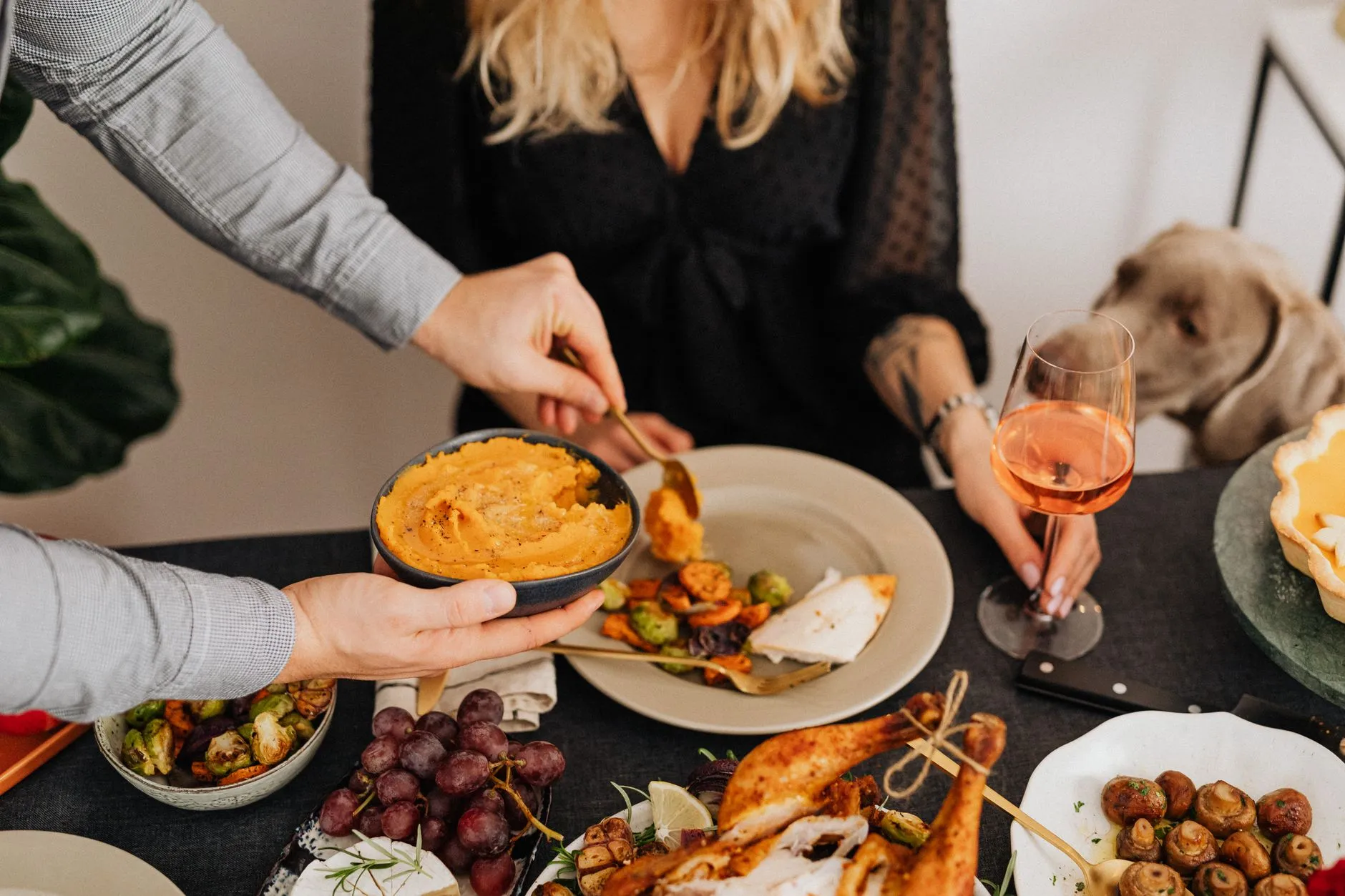 A cozy dinner scene featuring a variety of delicious dishes and a relaxing atmosphere.